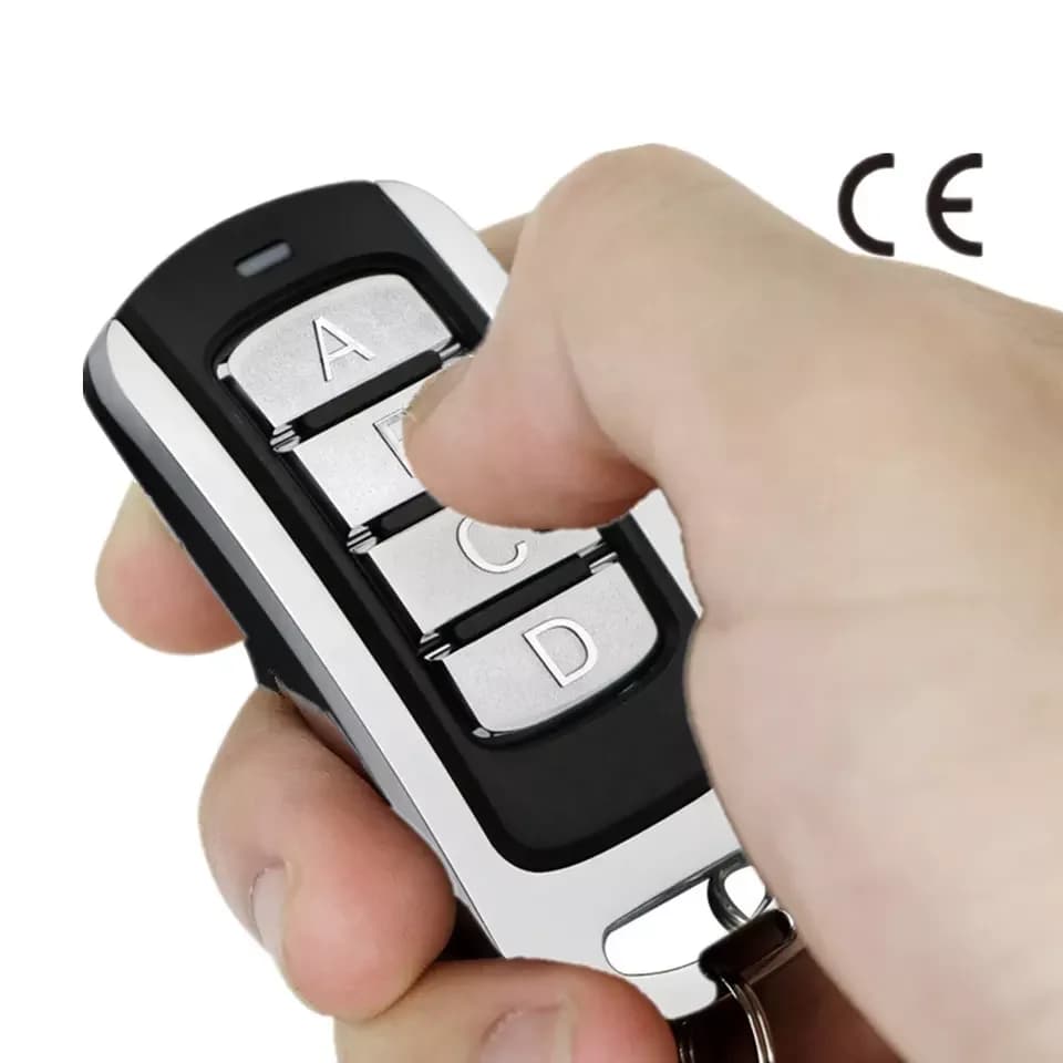Commande électronique universelle multifréquence pour porte de Garage