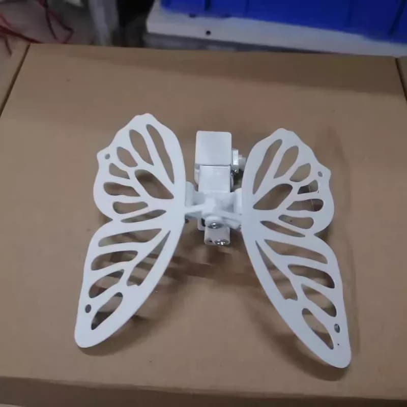 Dispositif d'ouverture et de fermeture électrique, simulation de papillon mécanique à ailes battante