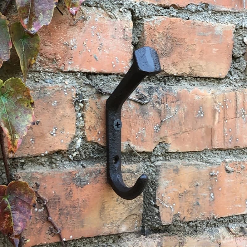 Crochet de porte en fonte et fer forgé