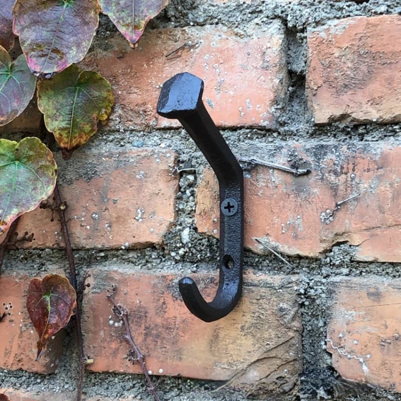 Crochet de porte en fonte et fer forgé
